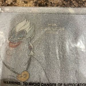 NWT Disney Coach Ursula Wristlet